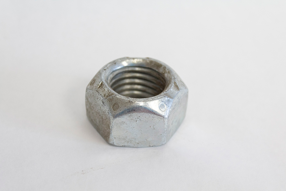 stump grinder mount linkage nut