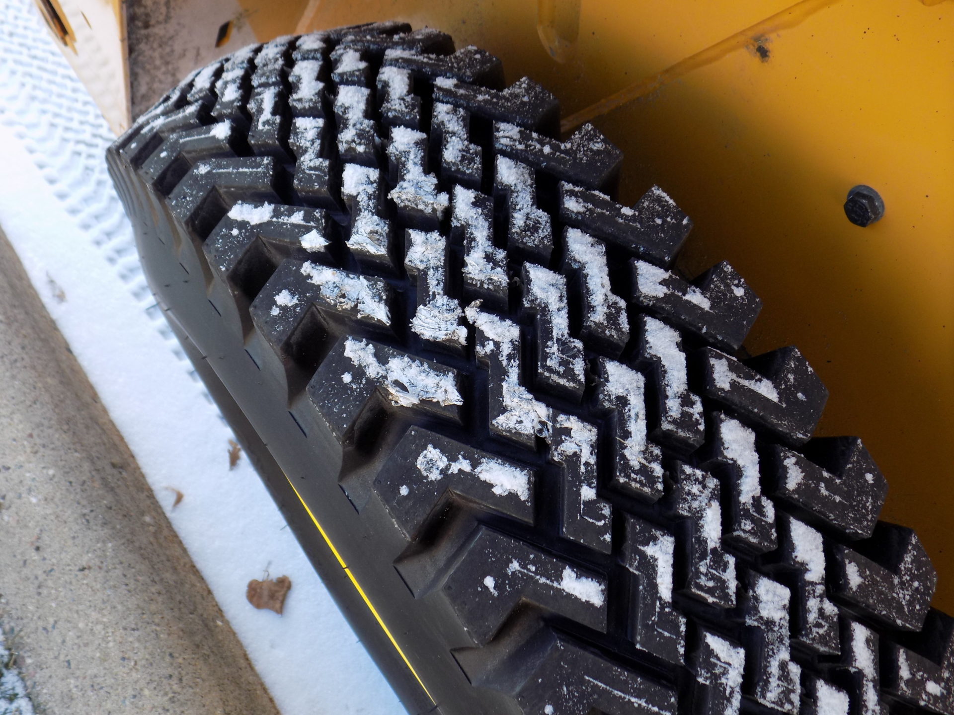 wolf paws pro series skid steer rims & tires - set